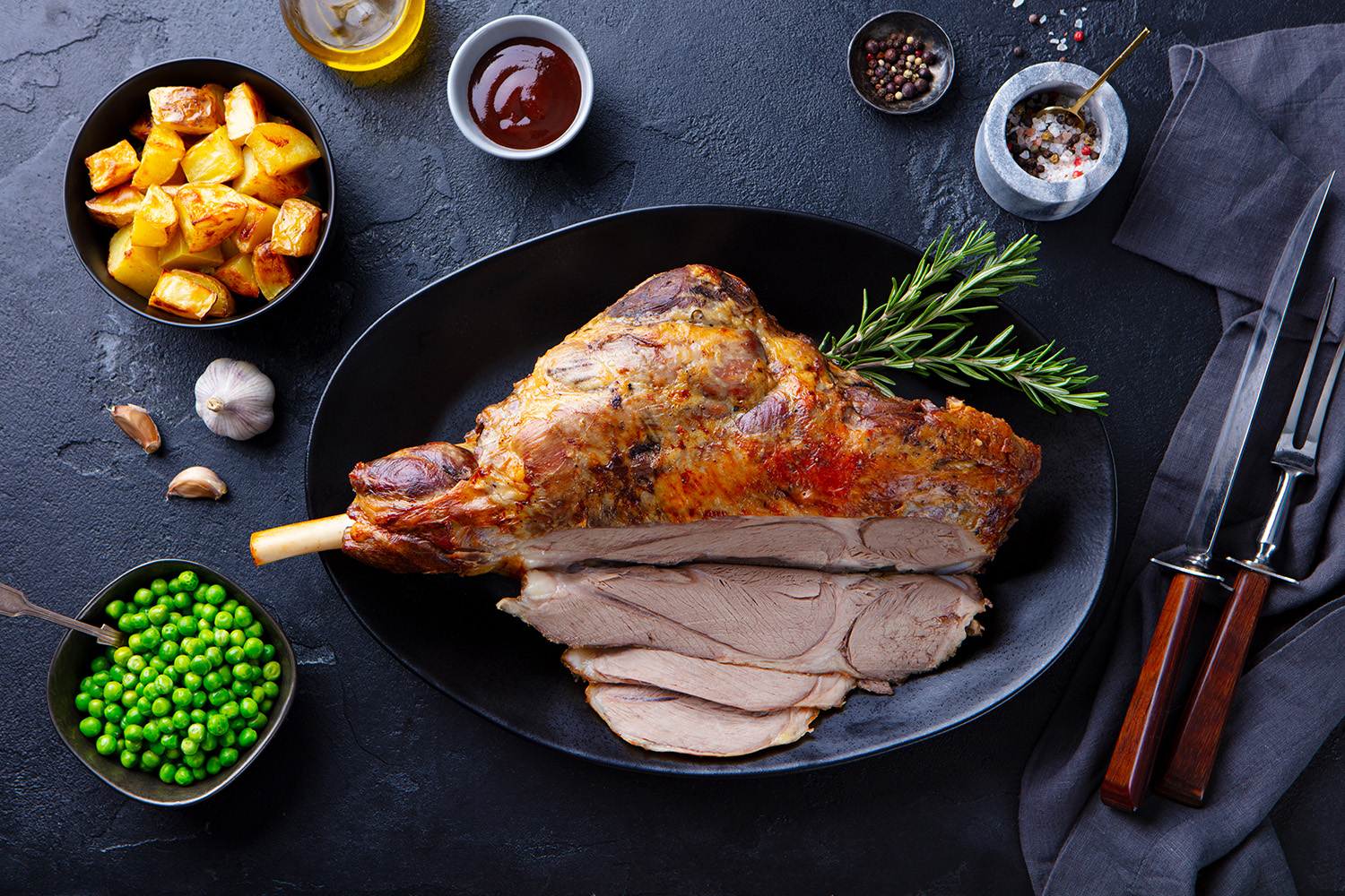 Roasted lamb leg with potato and green peas - Intwood Farm & Butchers Roasted lamb leg with potato and green peas