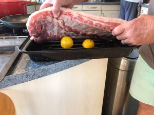 Belly Pork on the BBQ domed using lemons