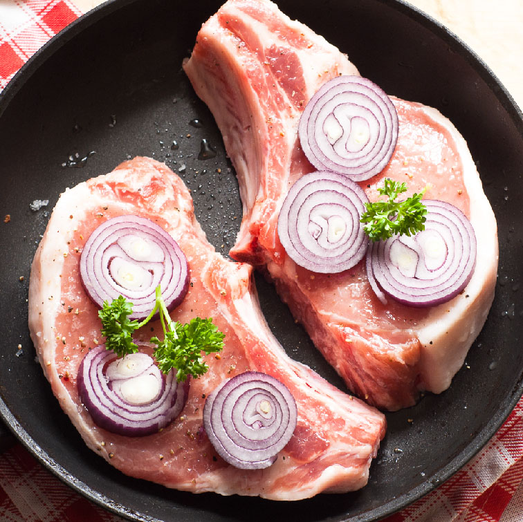 Pork Chop in a frying pan